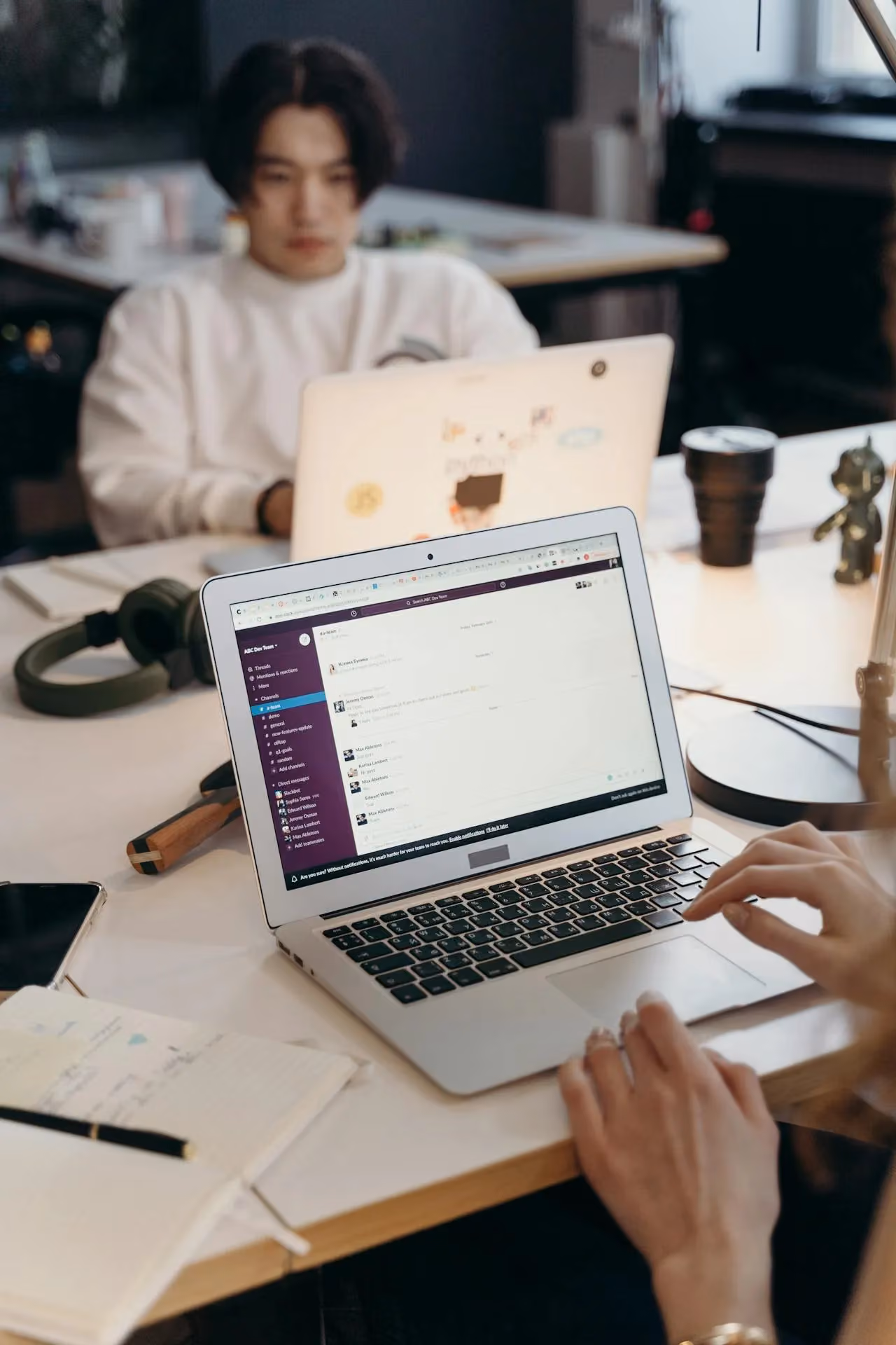Person working on a laptop researching local businesses
