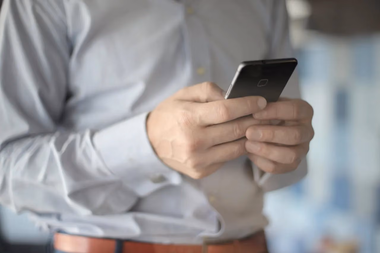 Person searching for a business on their smartphone